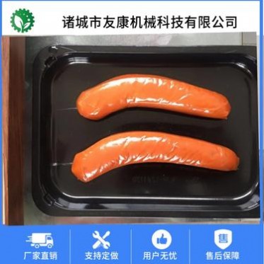 友康食品級不銹鋼真空貼體包裝設(shè)備 黑豬肉外覆膜真空貼體機 廠家定制貼體包裝機